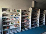 a lot of books on the shelves in the library