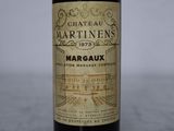 a bottle of wine that is sitting on a table