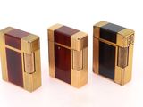 three different types of lighters are lined up on a white surface