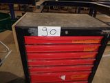 an image of a red tool cabinet in a warehouse