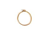 a close up of a gold ring on a white surface