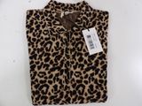 a brown and black leopard print shirt with a tag on it