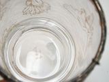 a close up of a glass of water on a table