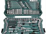 a green tool case filled with lots of tools on top of a white background