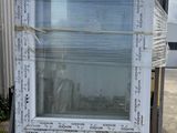 a large white window with writing on it sitting on a pallet