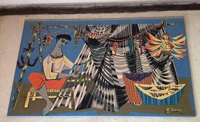 une image d'un tableau sur le mur d'un bâtiment