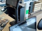 a desk with a laptop and a monitor on it