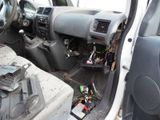 the interior of a car with a bunch of electronics inside of it