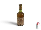 a bottle of wine that is sitting on a table