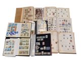 many different types of stamps on the pages of a book
