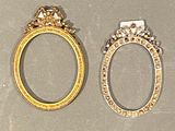 two gold rings with diamonds and a gold ring with a crown