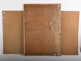 three pieces of cardboard sitting on a table next to each other