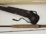 two different types of fishing rods on the table