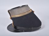 a black hat with a tan band on it