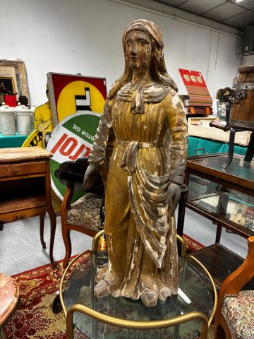 Sainte, sculpture en bois doré. Manques de dorure, trous de vers ...
