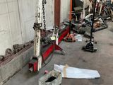 a picture of a garage with a lot of tools on the floor