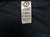 a close up of a label on a black jacket