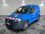 a blue van that is parked in a room
