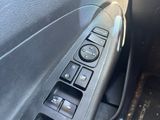 a close up of a car ' s dashboard with buttons