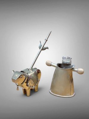 two metal objects that are sitting next to each other