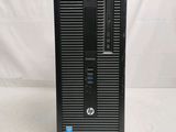 a close up of a desktop computer on a white surface