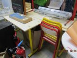 a desk with a chair and a fire hydrant on it