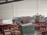 a large amount of wood in a warehouse area