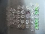 a lot of empty plastic cups sitting on a table
