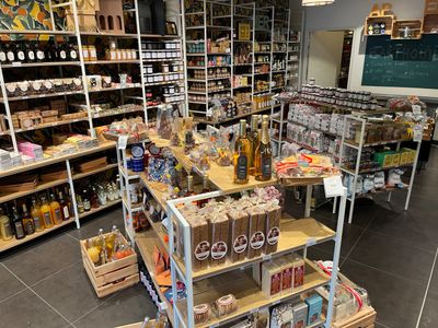 many shelves of food and drinks in this store