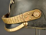 a close up of a helmet on a stand