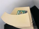 a book that is sitting on top of a book shelf