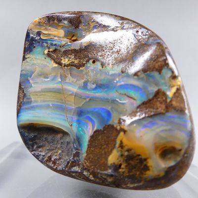 a close up of a rock with a blue and yellow pattern on it