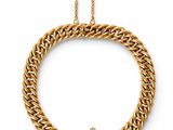 a gold chain bracelet with a sapphire stone and diamond clasp