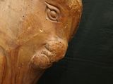 a statue of a man with a hat on his head