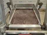 a conveyor belt with a conveyor belt on it