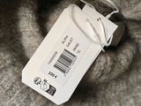 a tag that is attached to the back of a cell phone