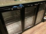 a glass door that is open on a counter