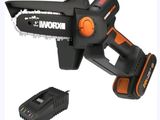 a black and decker electric chainsaw with a battery and charger