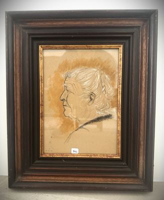 painting of a man in profile in a brown frame on a wall
