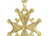 une image représentant un collier en or orné d'une croix et d'un oiseau
