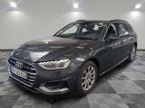 the grey audi wagon is parked on a checkered tile floor
