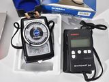 a box with a digital compass and a box with a digital compass