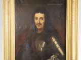 une peinture à l'huile représentant un homme en armure tenant une épée