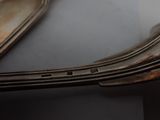 a close up of a silver plate with a fork and knife