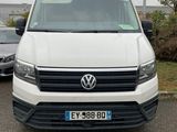 a white van that is parked in a parking lot