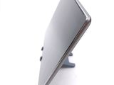 a close up of a cell phone on a stand