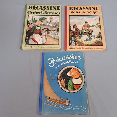 trois livres pour enfants posés sur une table blanche