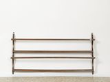 an image of a wooden shelf on a wall in a room