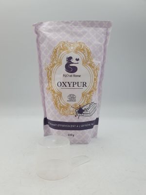 un gros plan d'un sachet d'Oxypur posé sur une surface blanche