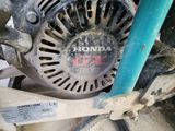 a close up of a motorcycle with a blower on it ' s side